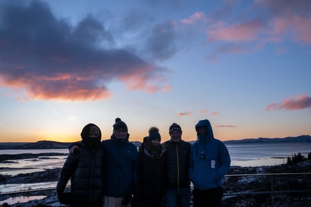 Happy group at sunrise in Thingvellir National Park