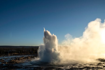 Strokkur, the geyser, photographed halfway through its eruption