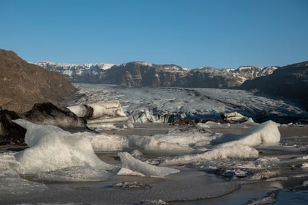 Beautiful details of ice on the edge of water in Sólheimajökull