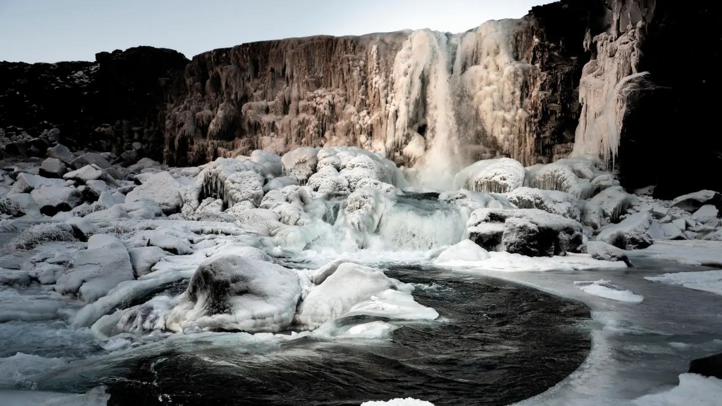 A geyser is spouting a huge cloud of steam