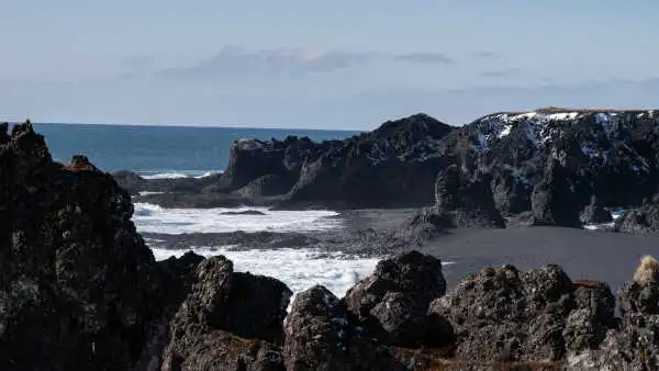 Black Sand beach, ocean and basaltic cliffs