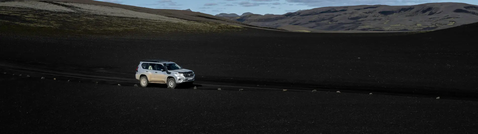 Our toyota Landcruiser in a dark desert