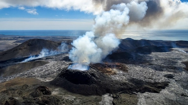 Passengers witnessing volcanic activity from helicopter window