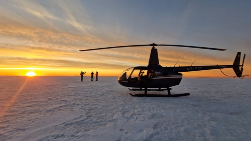 Helicopter landed on pristine Icelandic glacier