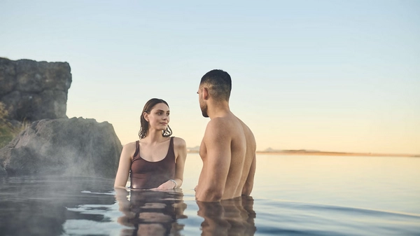 Relaxing in the warm geothermal waters of Sky Lagoon