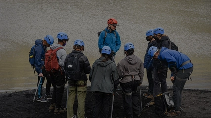 Professional photography session on Sólheimajökull glacier with dramatic ice formations