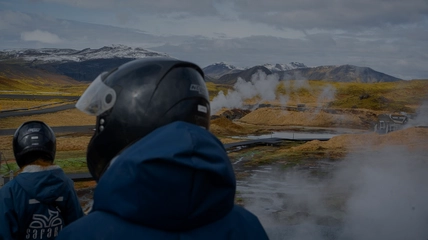 ATV riders crossing rivers in the spectacular Hengill mountain range