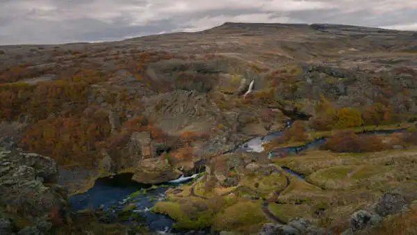 Panorama over bushes, waterfalls, streams of water