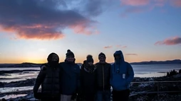 Happy group at sunrise in Thingvellir National Park