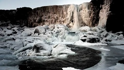 Frozen waterfall Öxarárfoss in the Thingvellir national Park