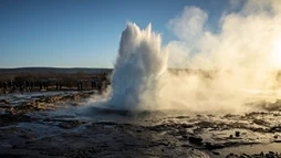 Strokkur, the geyser, photographed halfway through its eruption
