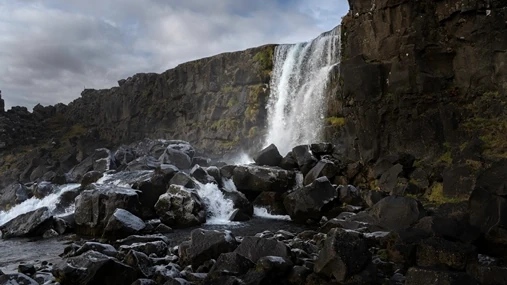 The waterfall of Öxarárfoss flows in the Þingvellir National Park
