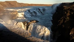 Gullfoss waterfall between shade and sun