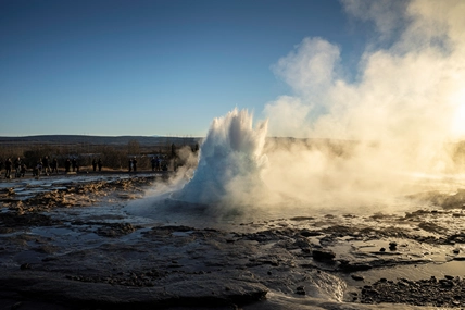 Happy travelers exploring Iceland's unique landscapes with expert guide