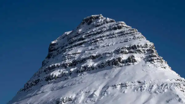 Top of a snow covered mountain