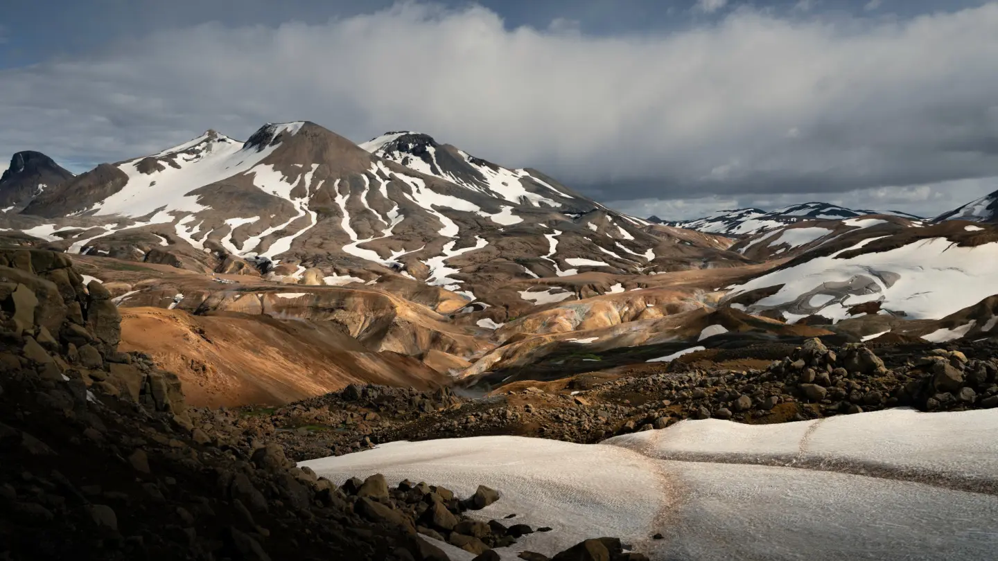 Colourful mountains, partly covered in snow