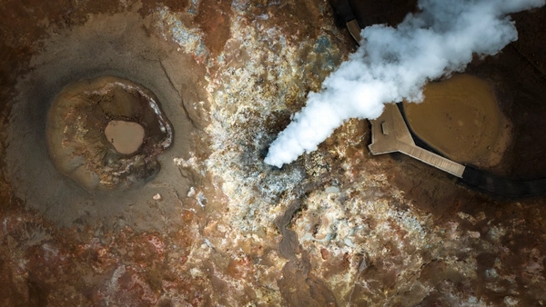 A huge cloud of steam is coming out of the hot spring of Gunnuhver