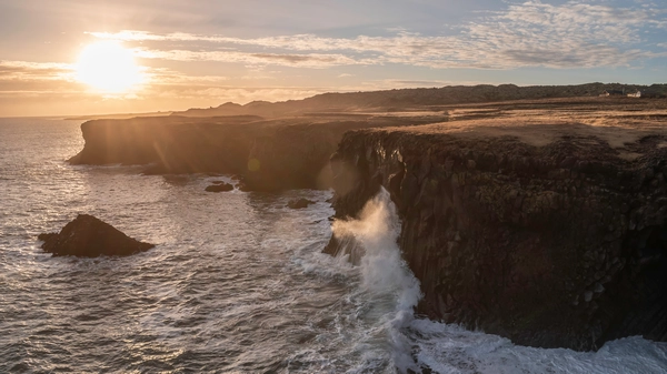 The cliffs of Arnarstapi photographed at sunset