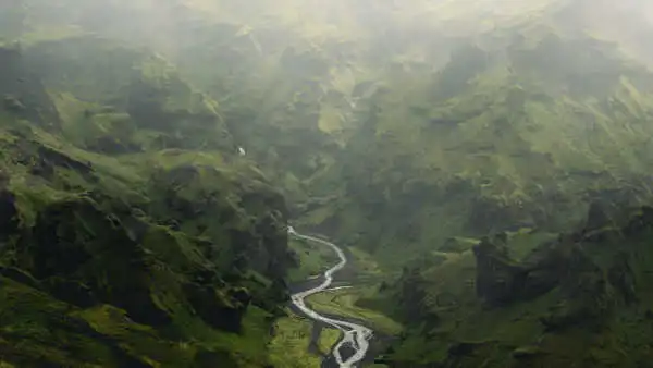 Misty day over green mountains